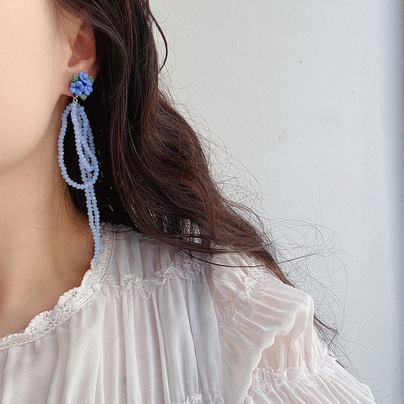 Blue flower beaded earrings