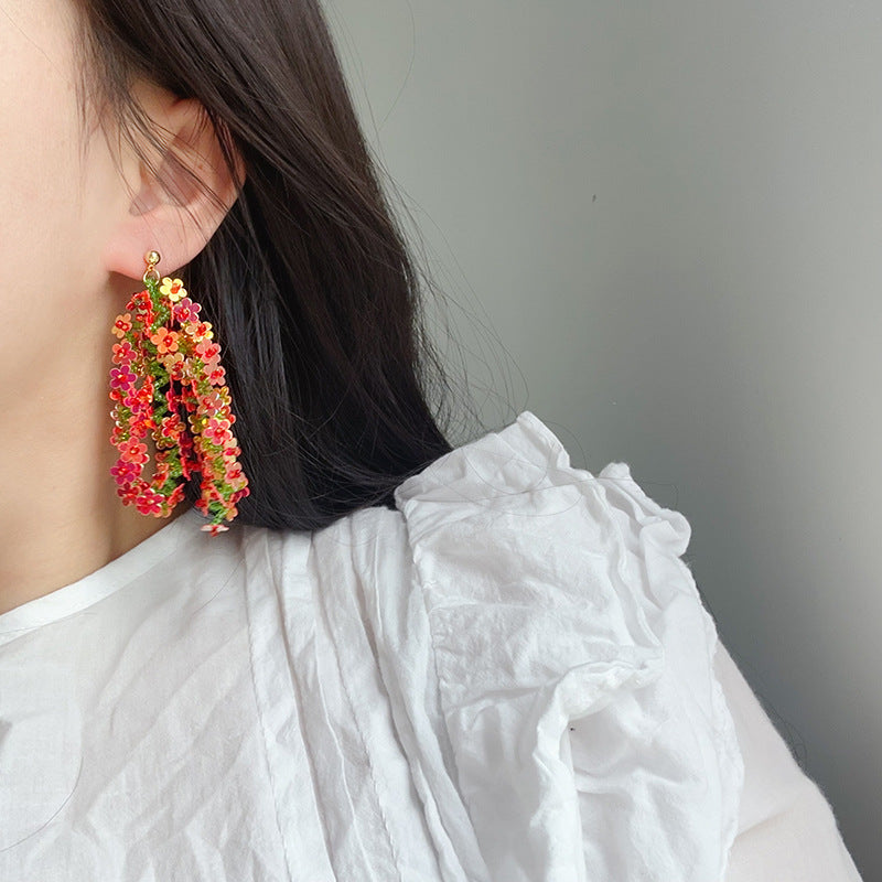 Laser Sequin Flower Tassel Earrings